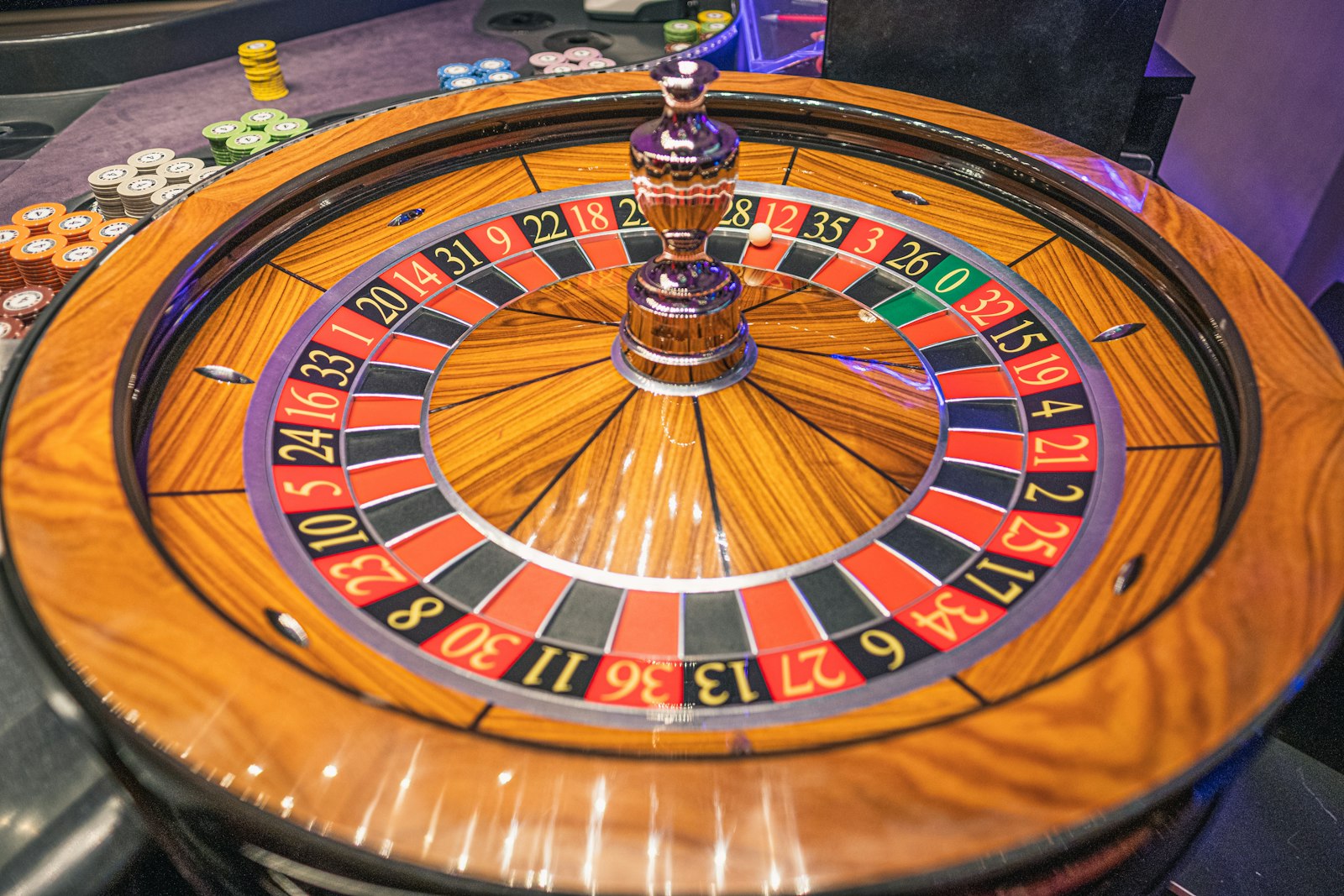 Polished roulette wheel on a casino table